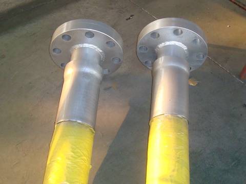 Two rotary drilling hose with flanges on the ground.